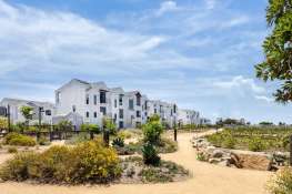 What happens when a neighborhood is built around a farm